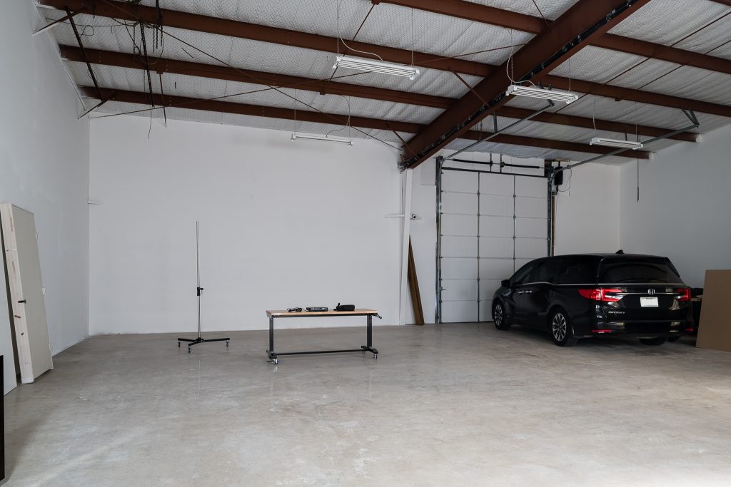 Large studio with garage access for loading equipment.